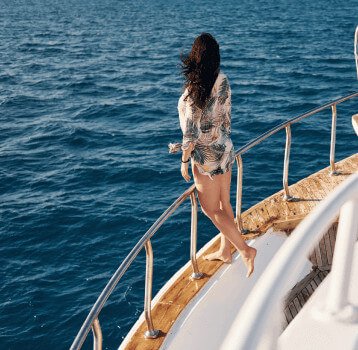 mature-woman-standing-on-the-yacht-and-enjoying-he-2023-11-27-05-06-28-utc-1.jpg